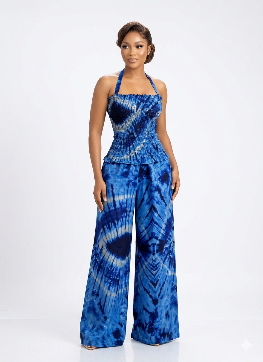 Smokey Top and Trousers Woman wearing blue ruched top and wide leg trousers set